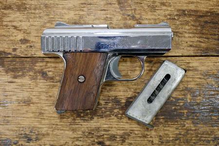 P-25 25 AUTO POLICE TRADE-IN PISTOL WOOD GRIPS