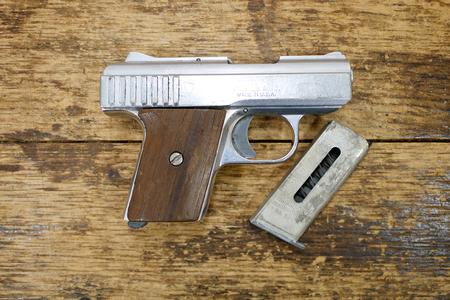 P-25 25 AUTO POLICE TRADE-IN PISTOL WOOD GRIPS